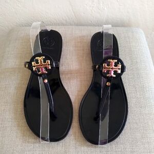 Tory Burch Black Thong Sandals with Gold Logo Accent